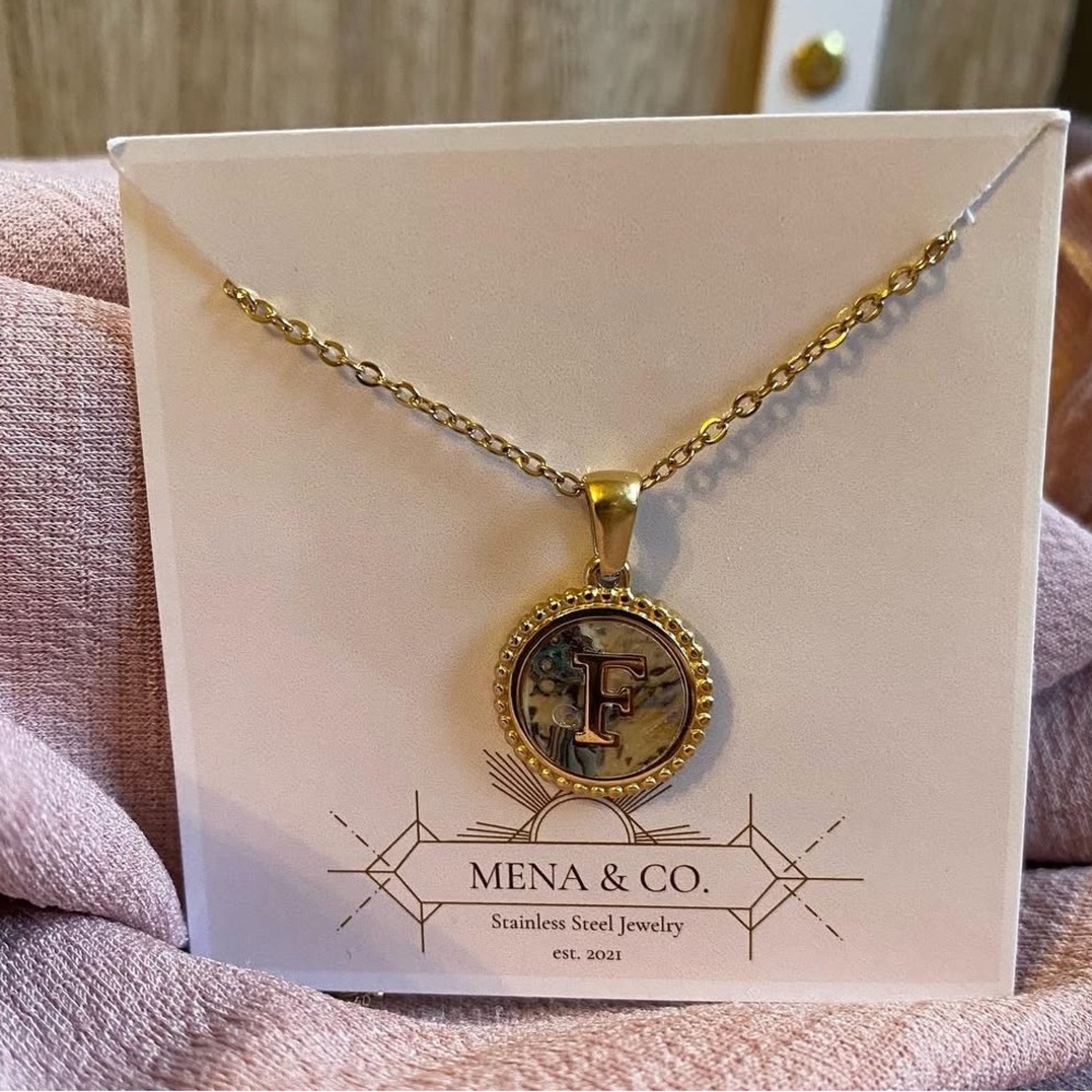 Stainless Steel Gold Initial Necklace Letter “F” with a beautiful marble inlay.